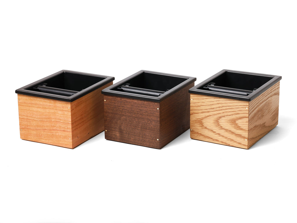 Specht walnut, oak, and cherry knock boxes with brass interiors.