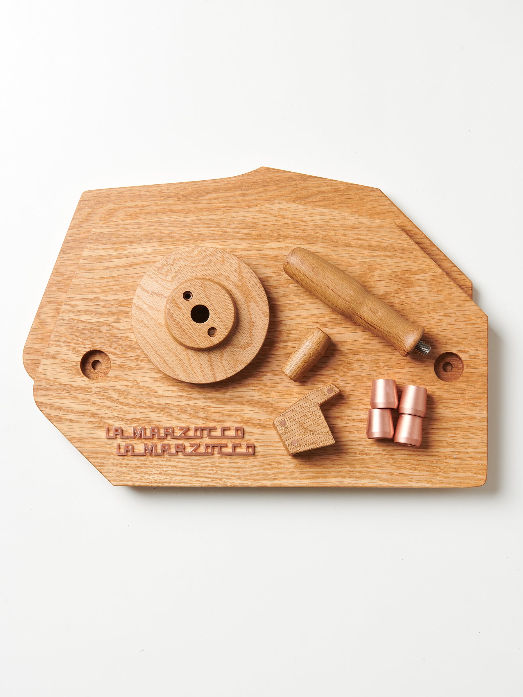 An oak Specht Wood Kit with copper feet for a La Marzocco GS3 espresso machine.