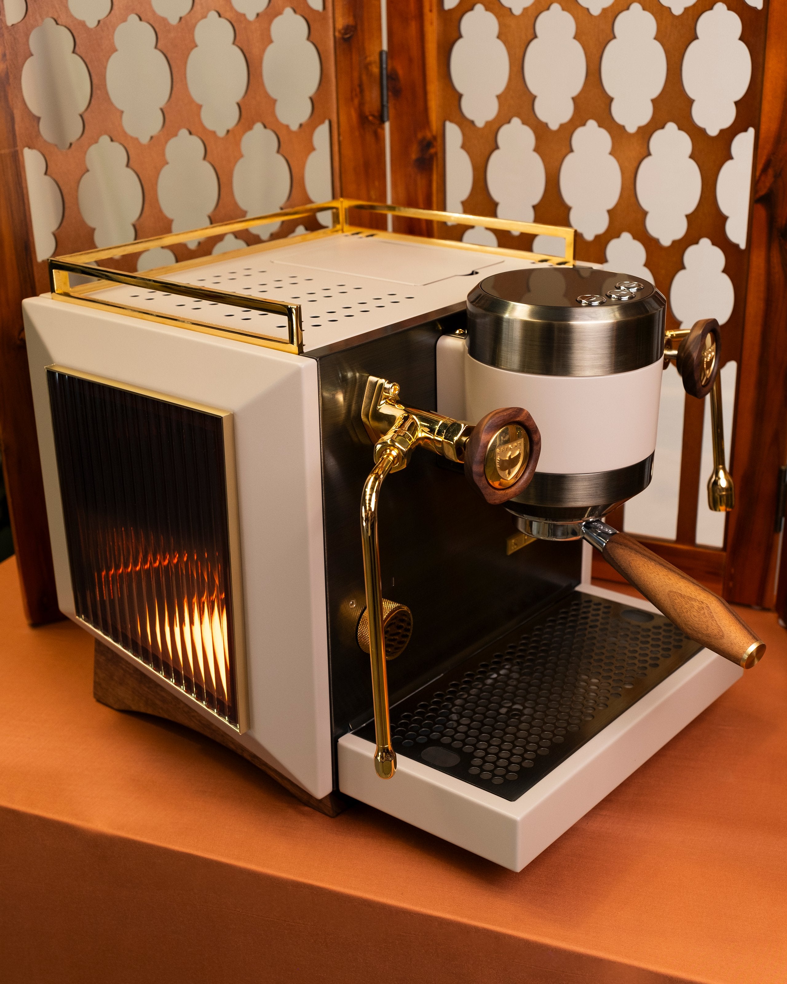 The Rocket Bicocca in White, Brass, and Walnut.
