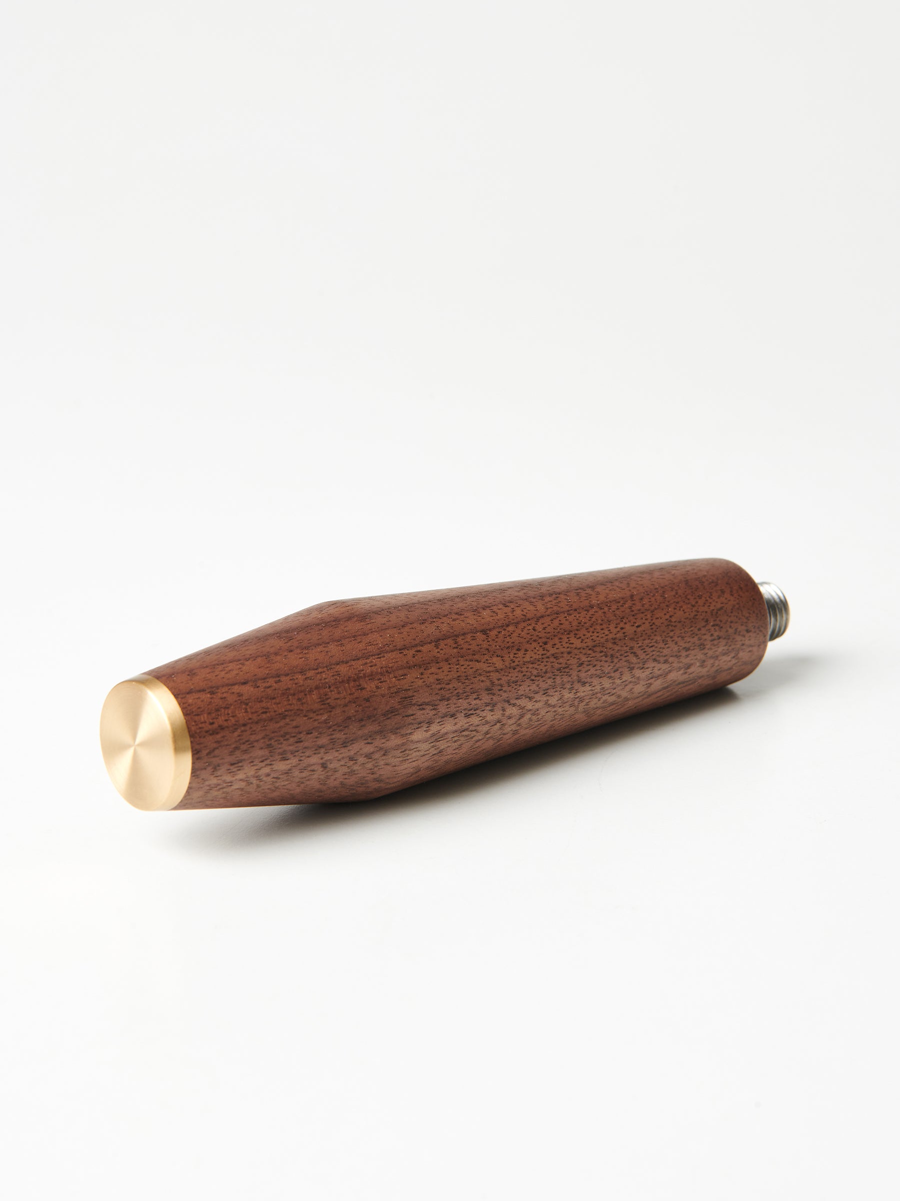 A Specht walnut portafilter handle with a brass end cap.