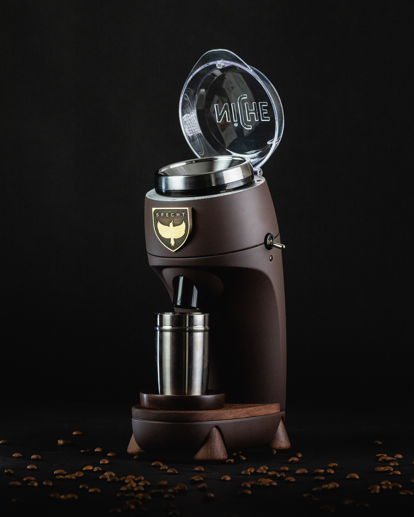 A custom, brown Niche Zero coffee grinder, made by Specht.