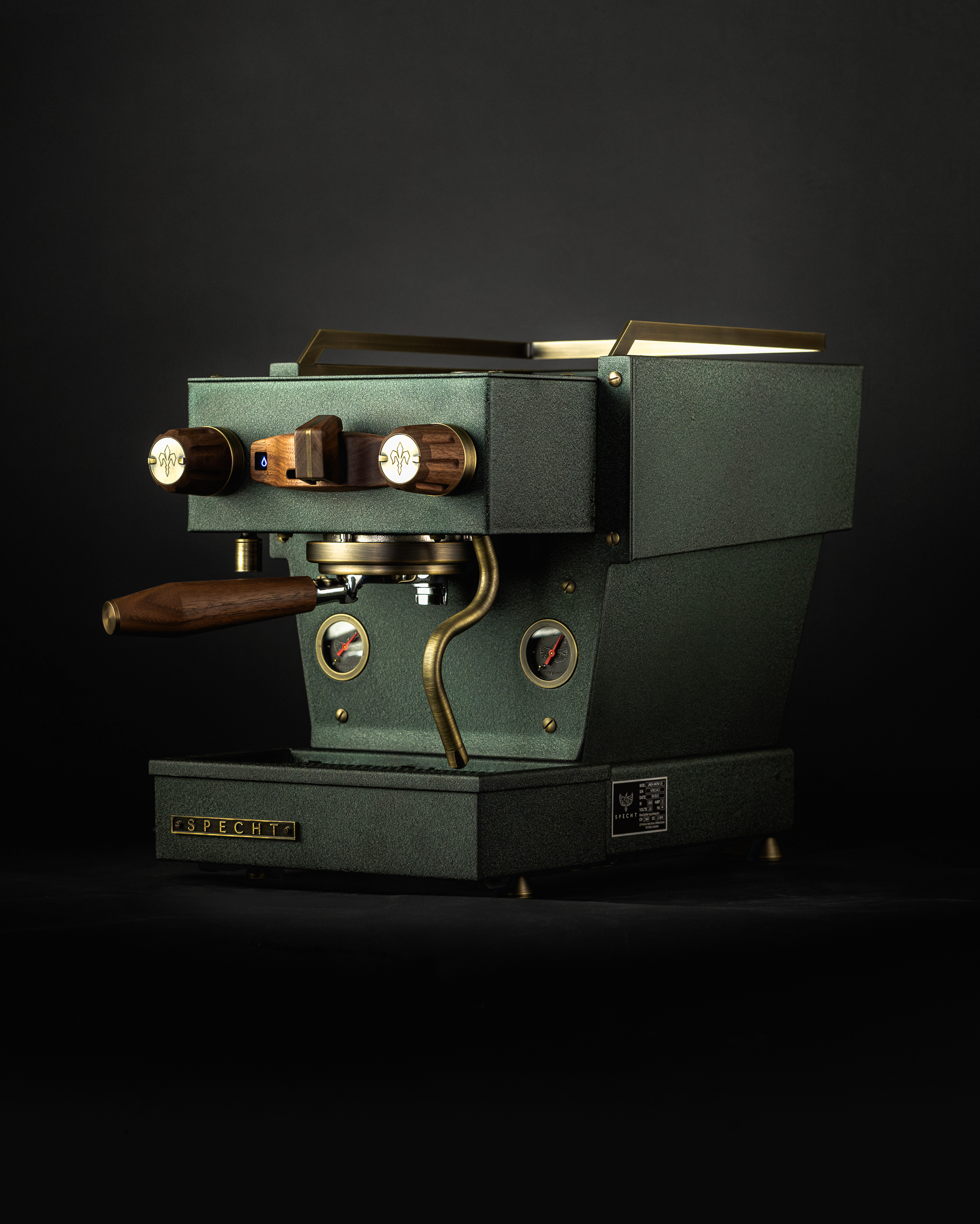 A deep emerald green La Marzocco Linea Micra espresso machine with walnut touchpoints, by Specht.