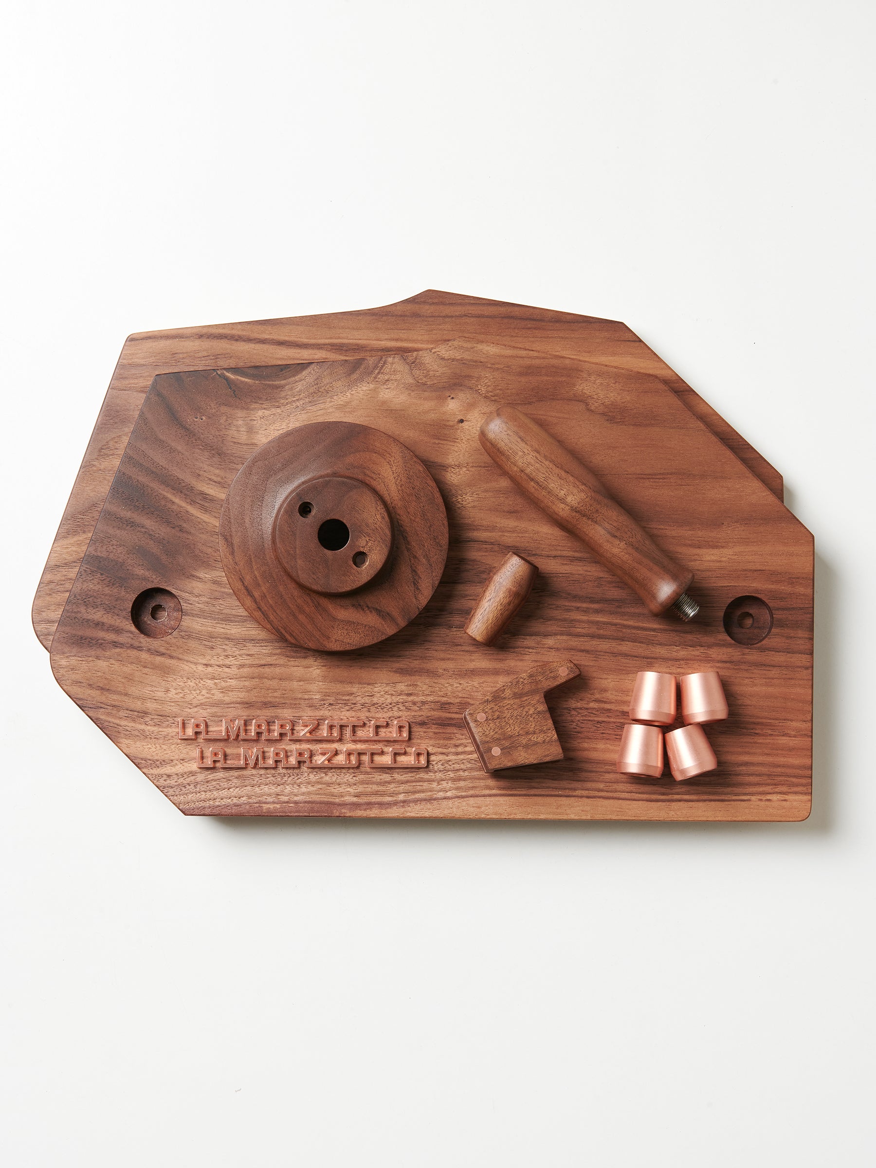 A dark walnut Specht Wood Kit with copper feet for a La Marzocco GS3 espresso machine.