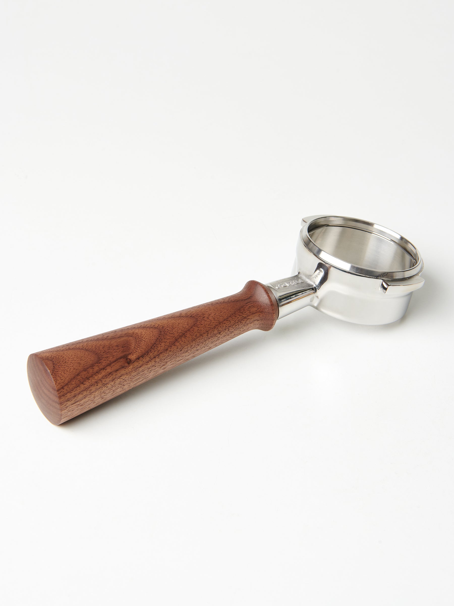 A bottomless Pesado portafilter with a Specht, Slayer-style walnut wood handle.